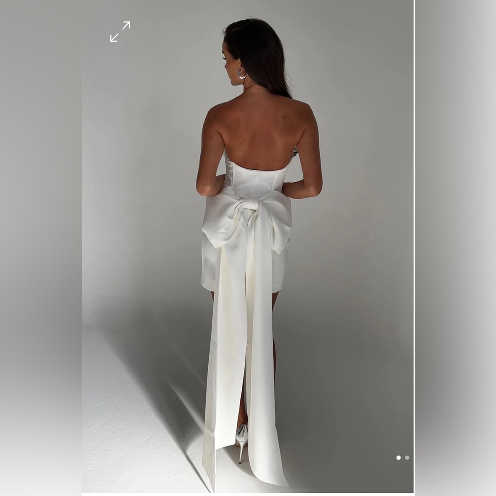 White bow back mini dress